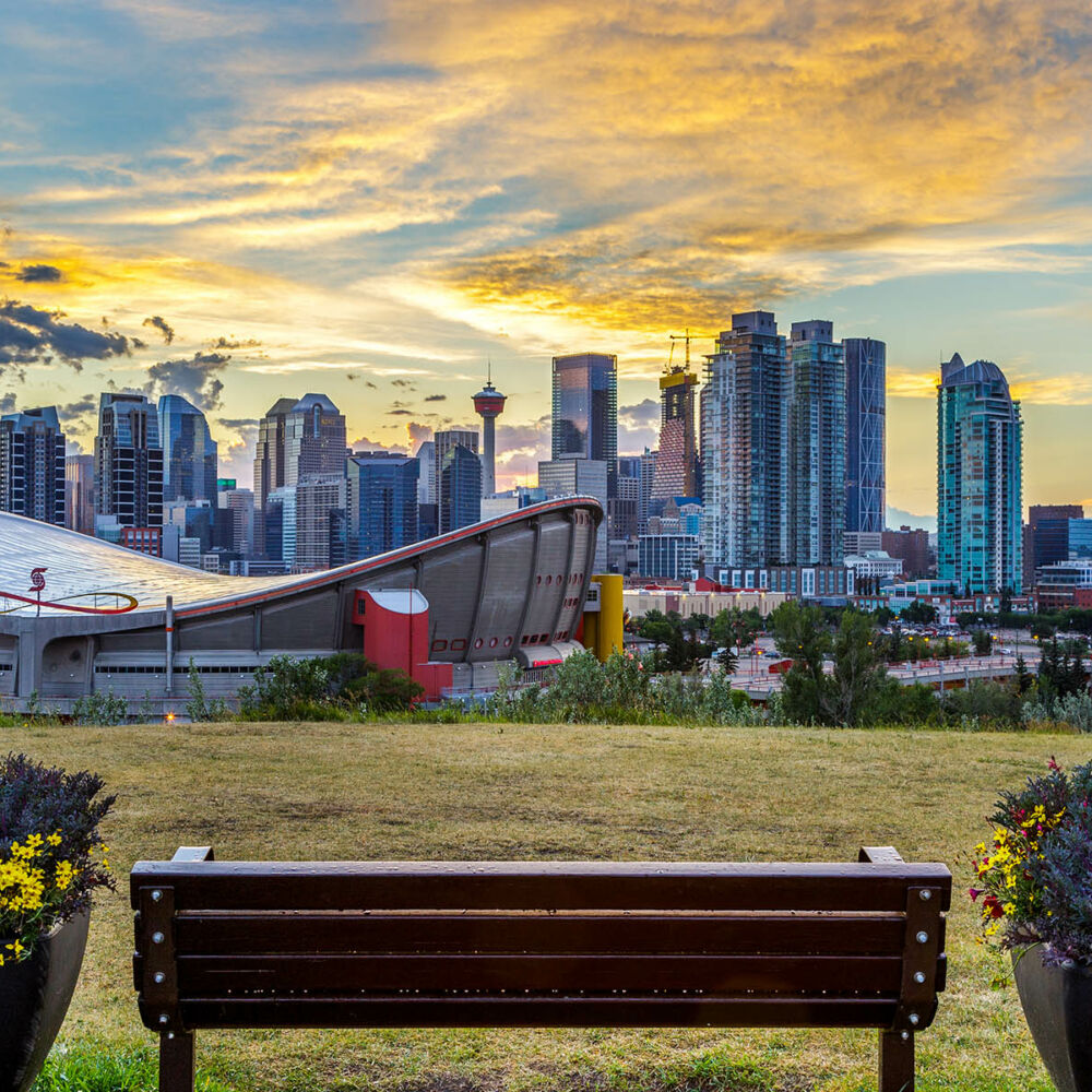 Calgary City. Sunset Downtown. Calgary Saddledome Sunset.