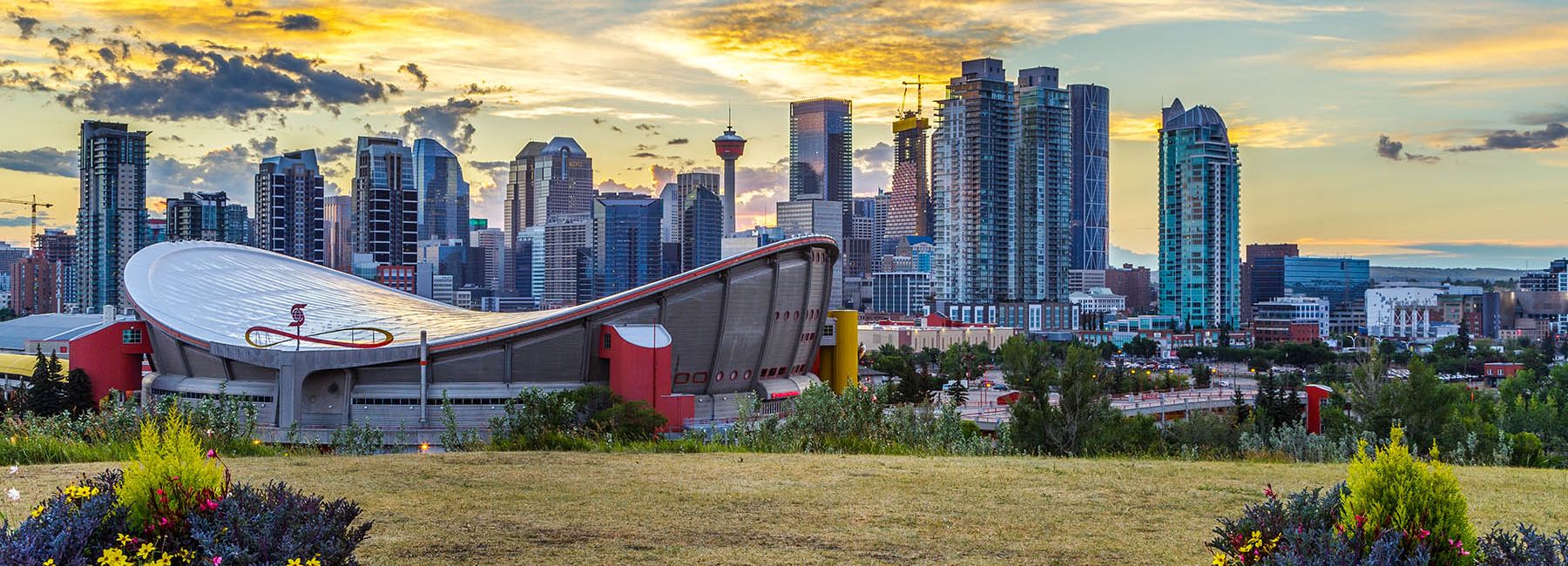 Calgary City. Sunset Downtown. Calgary Saddledome Sunset.